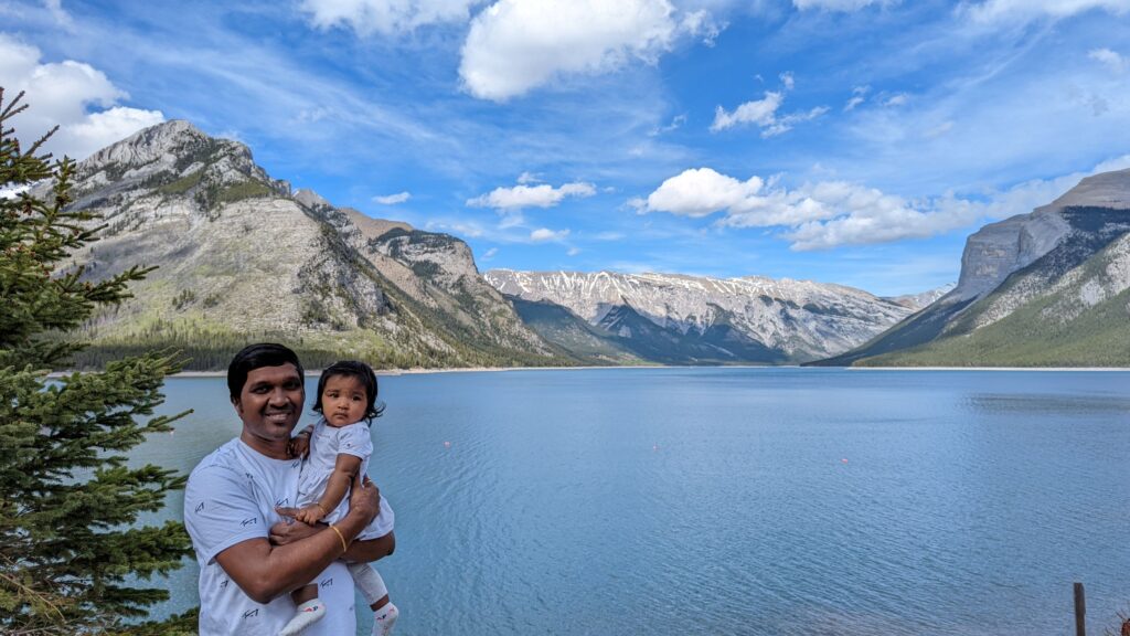 Image of a family in front of a blue lake with mountains in the background. 

A Weekend in Banff Plan a weekend trip to Banff What to do in Banff