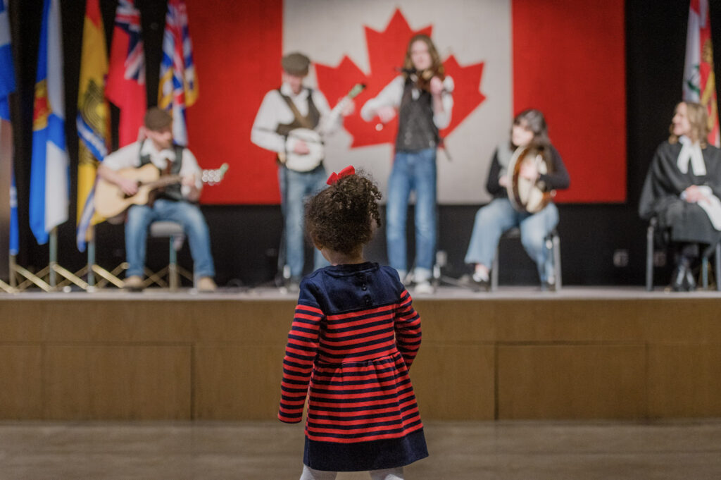 A young child at a Canadian citizenship ceremony.