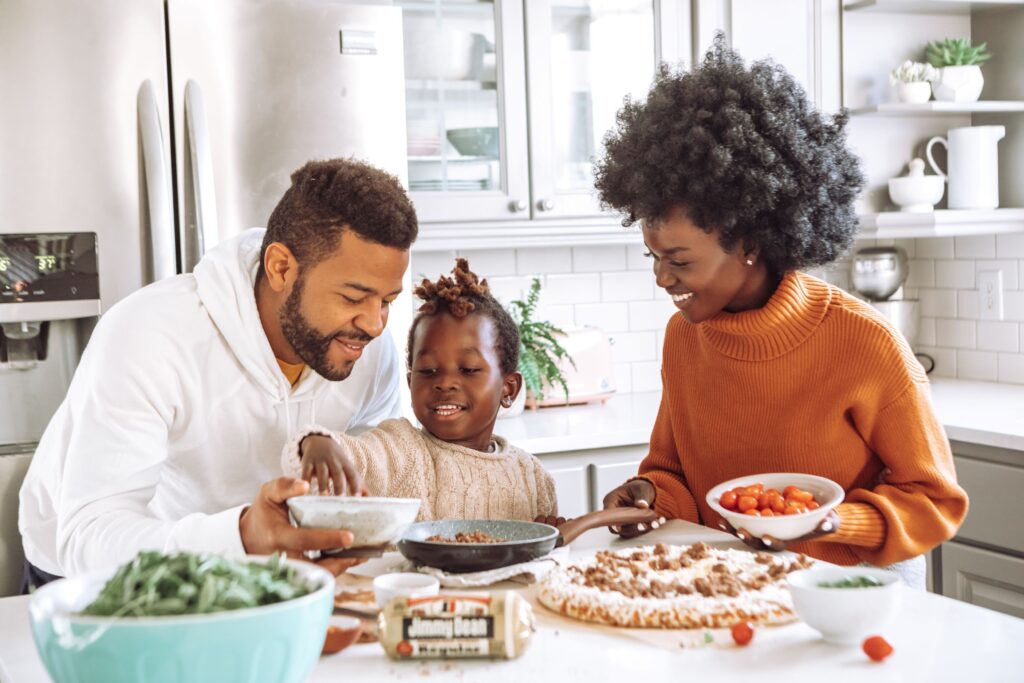 A Canadian family together in a kitchen.