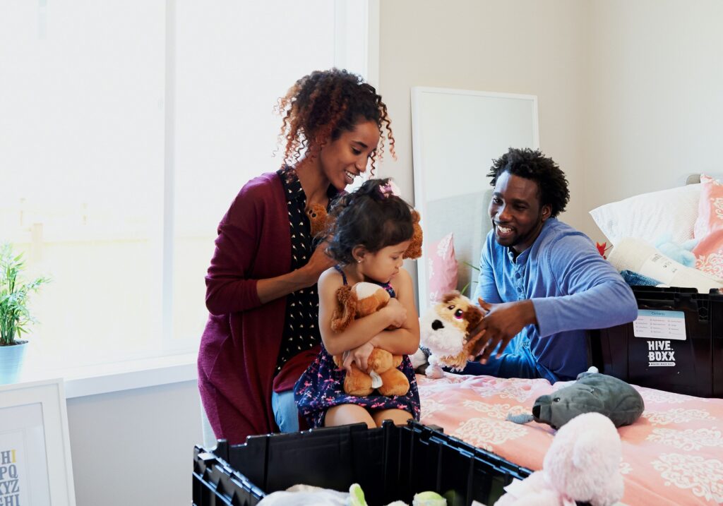 Family moving into their new home in Canada after getting their permanent residency.