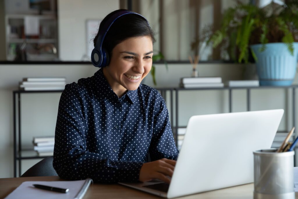 Person planning for their financial future while looking at a laptop screen.