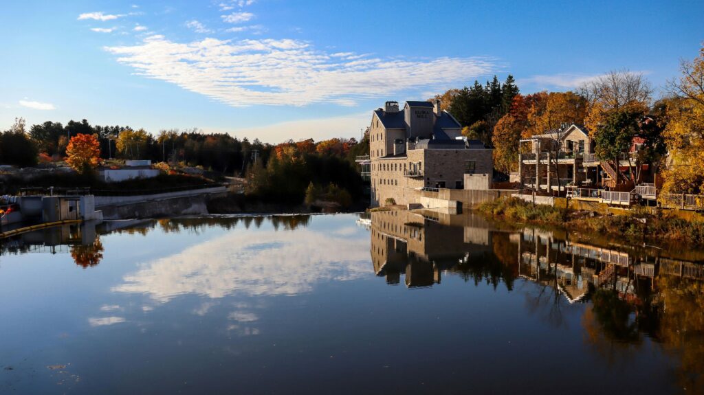 Photo of buildings in Elora, Ontario on the waterfront.