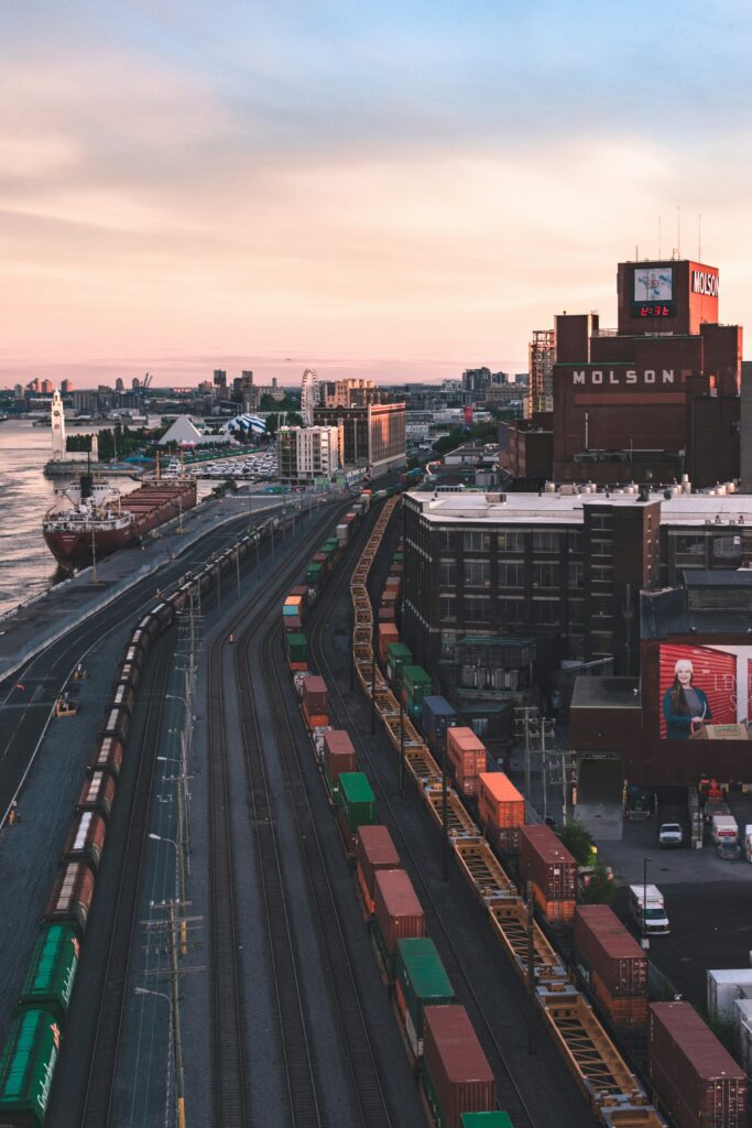 sunset over montreal's docks, montréal, and city in Montréal, also featuring trains and train rails